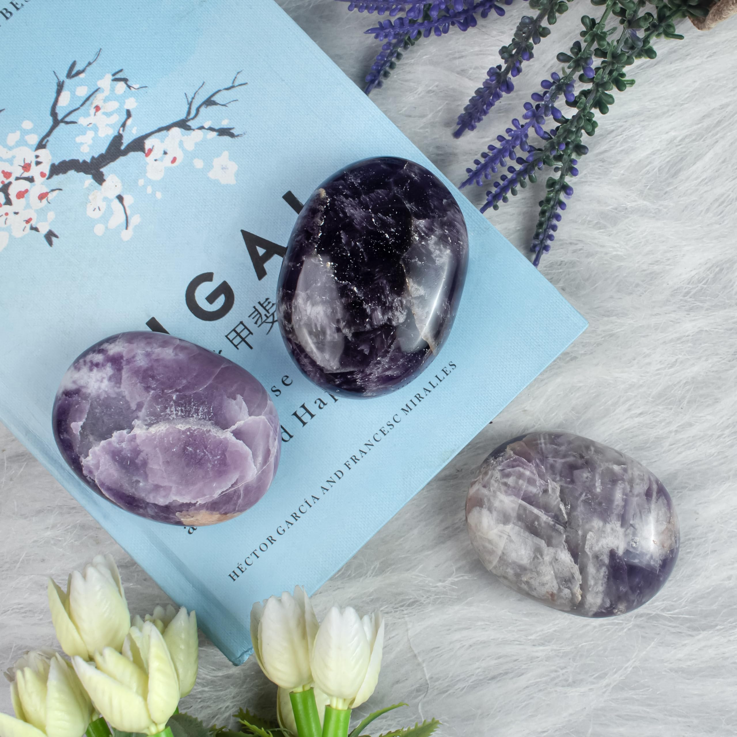 BEZAVO Amethyst Oval Palm Stone home decor piece with a subtle purple glow