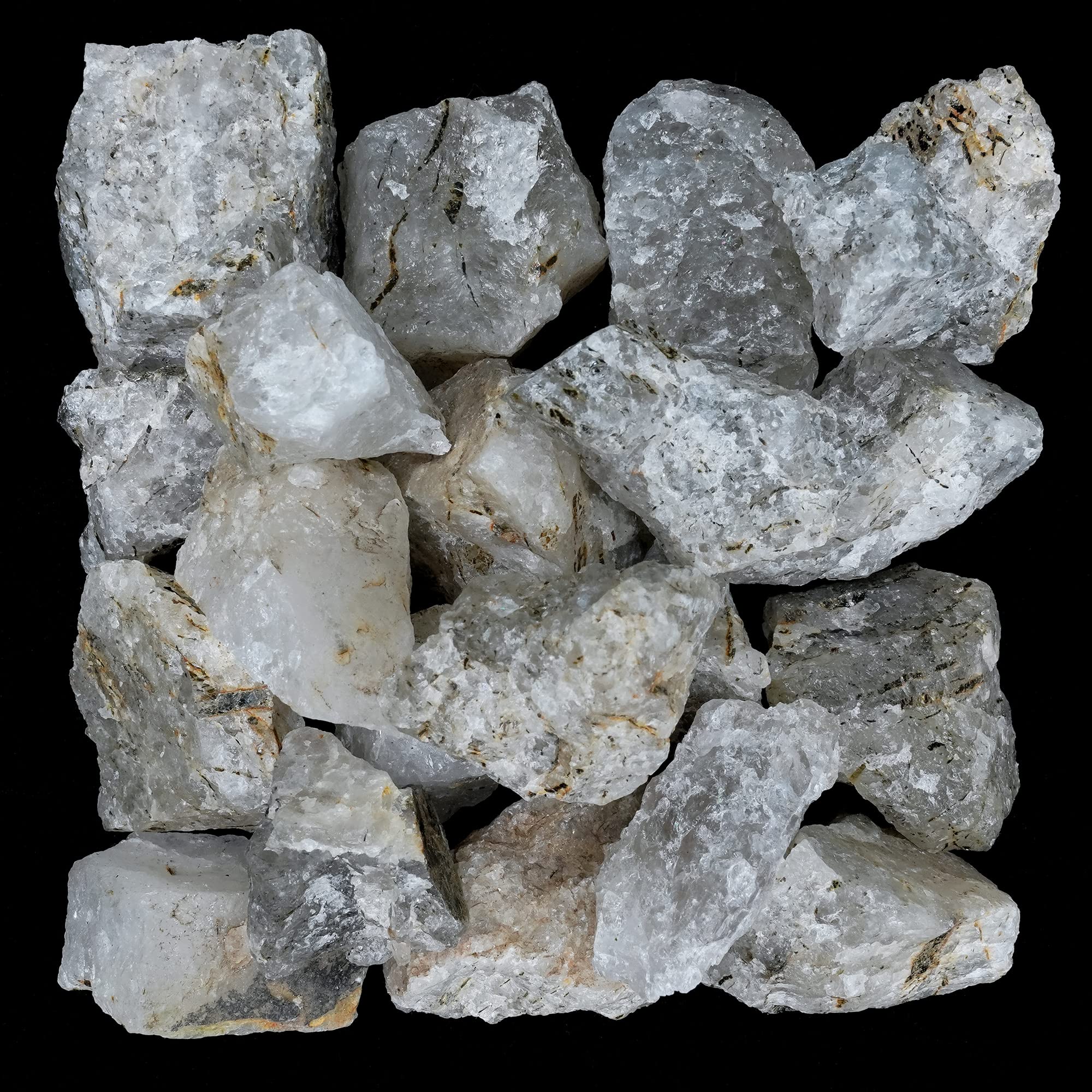 BEZAVO Black Rutile rough stones displayed for altar decor and ambience.