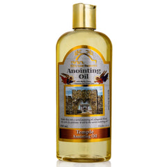 Bible Land Treasures Anointing Oil bottle on altar for focused prayer and blessing.