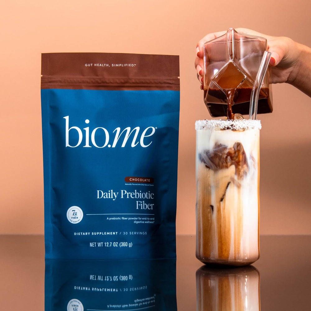 Bio.me fiber powder in glass showing a sugar-free beverage option