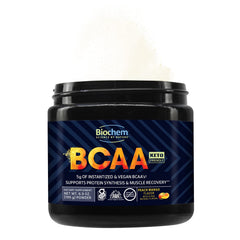 Biochem BCAA Peach Mango powder being dispensed from a scoop for hydration.