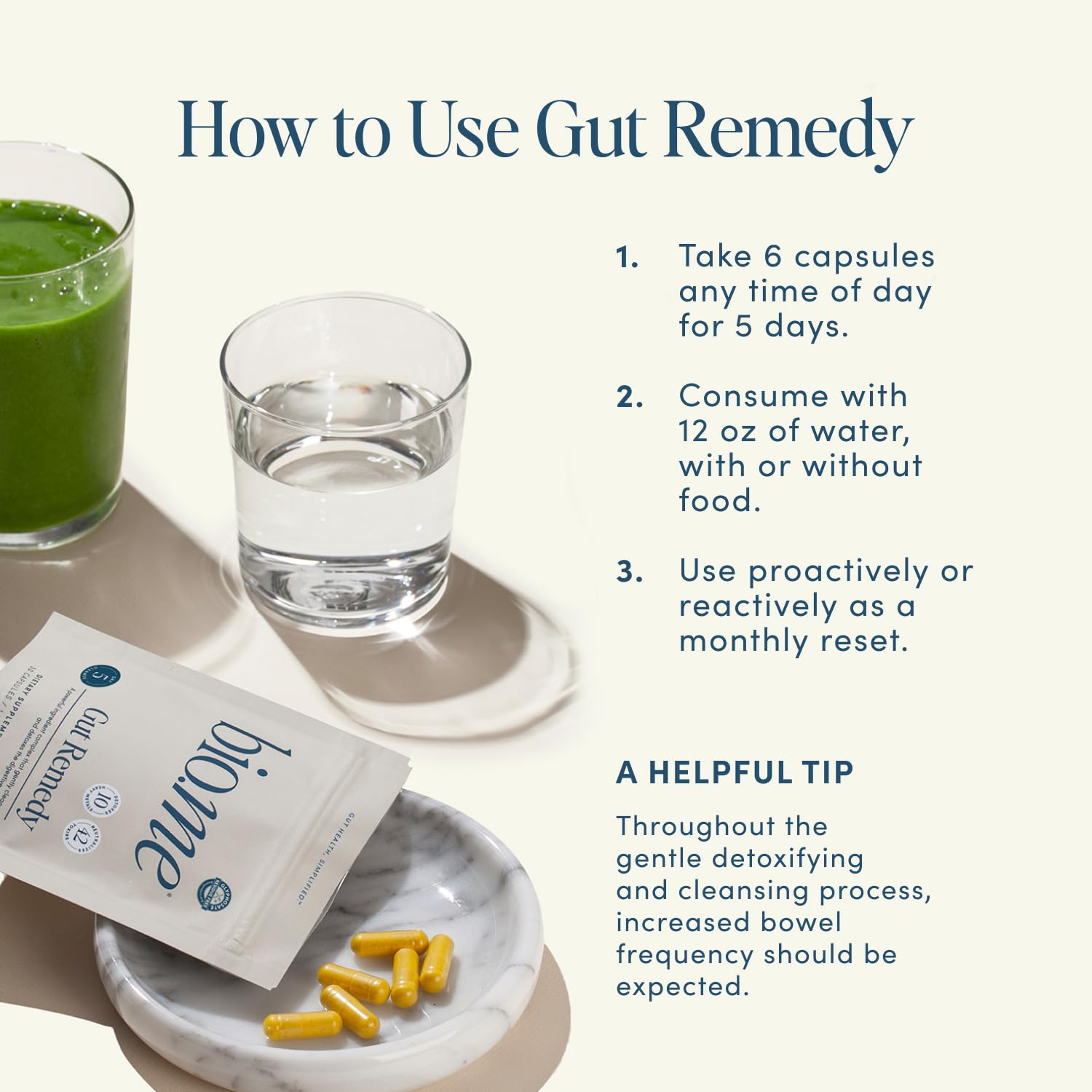 Glass of water beside Bio.me Biome Gut Remedy during the cleanse