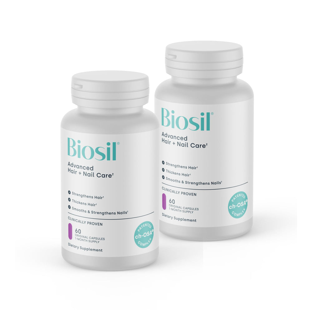 Biosil Advanced Hair + Nail Care bottle being poured to support daily use.