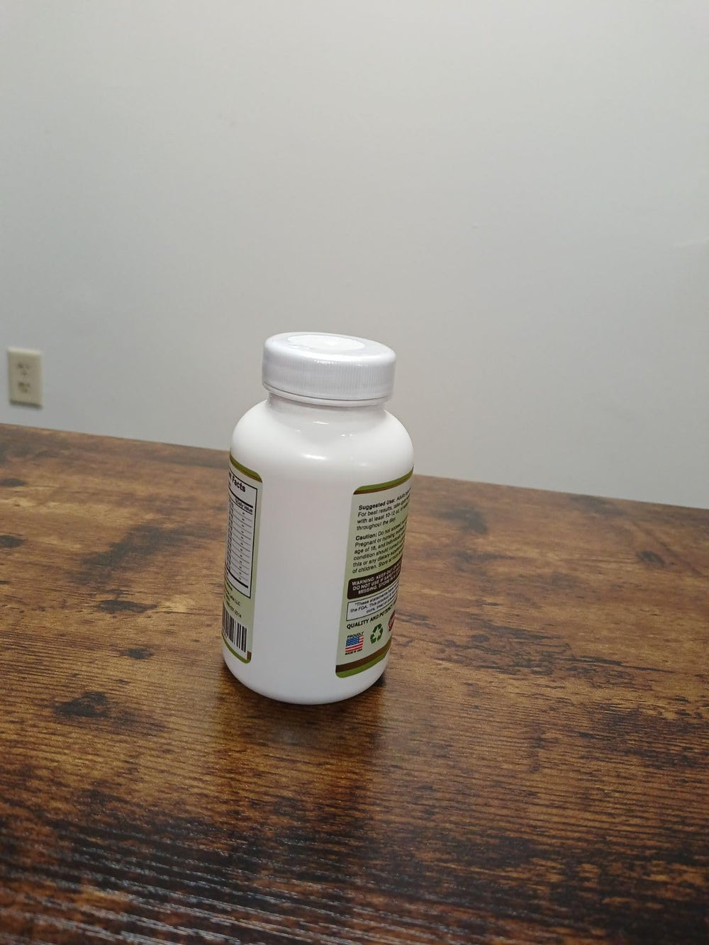 BioSource Labs Colonew on shelf beside healthy foods for digestive health.