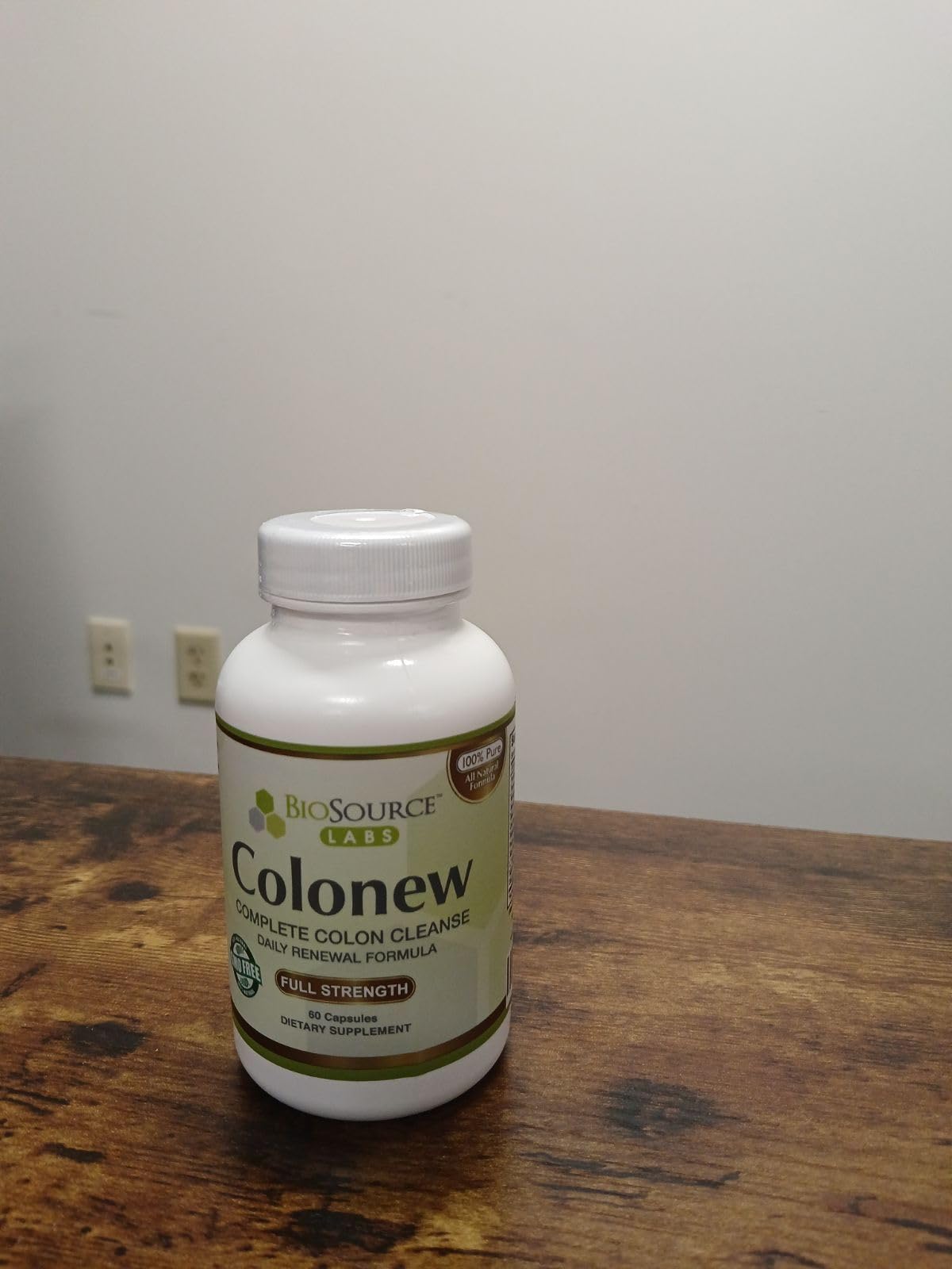 BioSource Labs Colonew bottle pouring capsules for gentle cleansing.