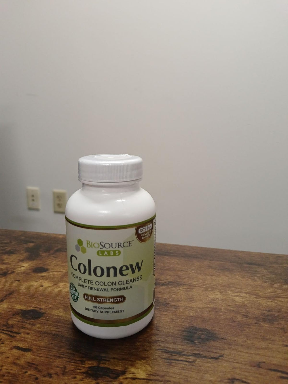 BioSource Labs Colonew bottle pouring capsules for gentle cleansing.
