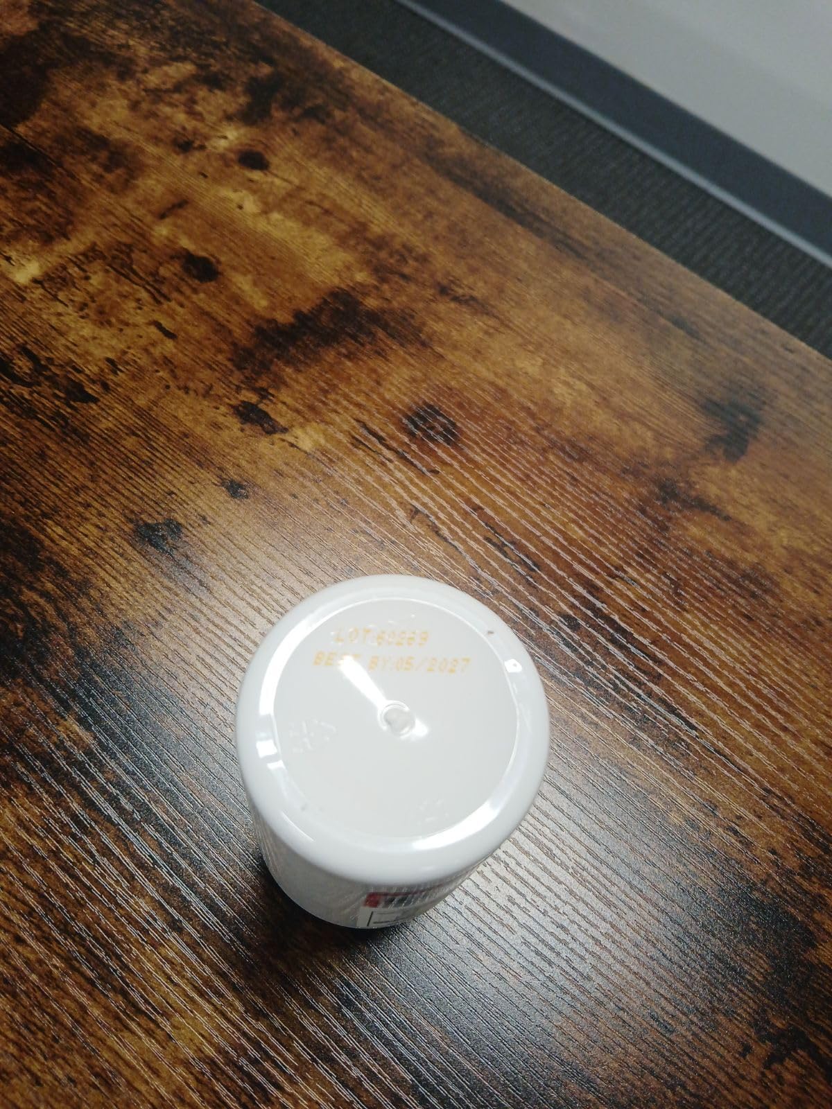 Quality guarantee seal beside Razburn bottle for customer confidence