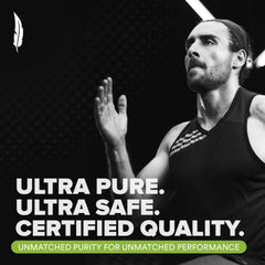 Birdman creatine monohydrate powder swirling into a glass of water