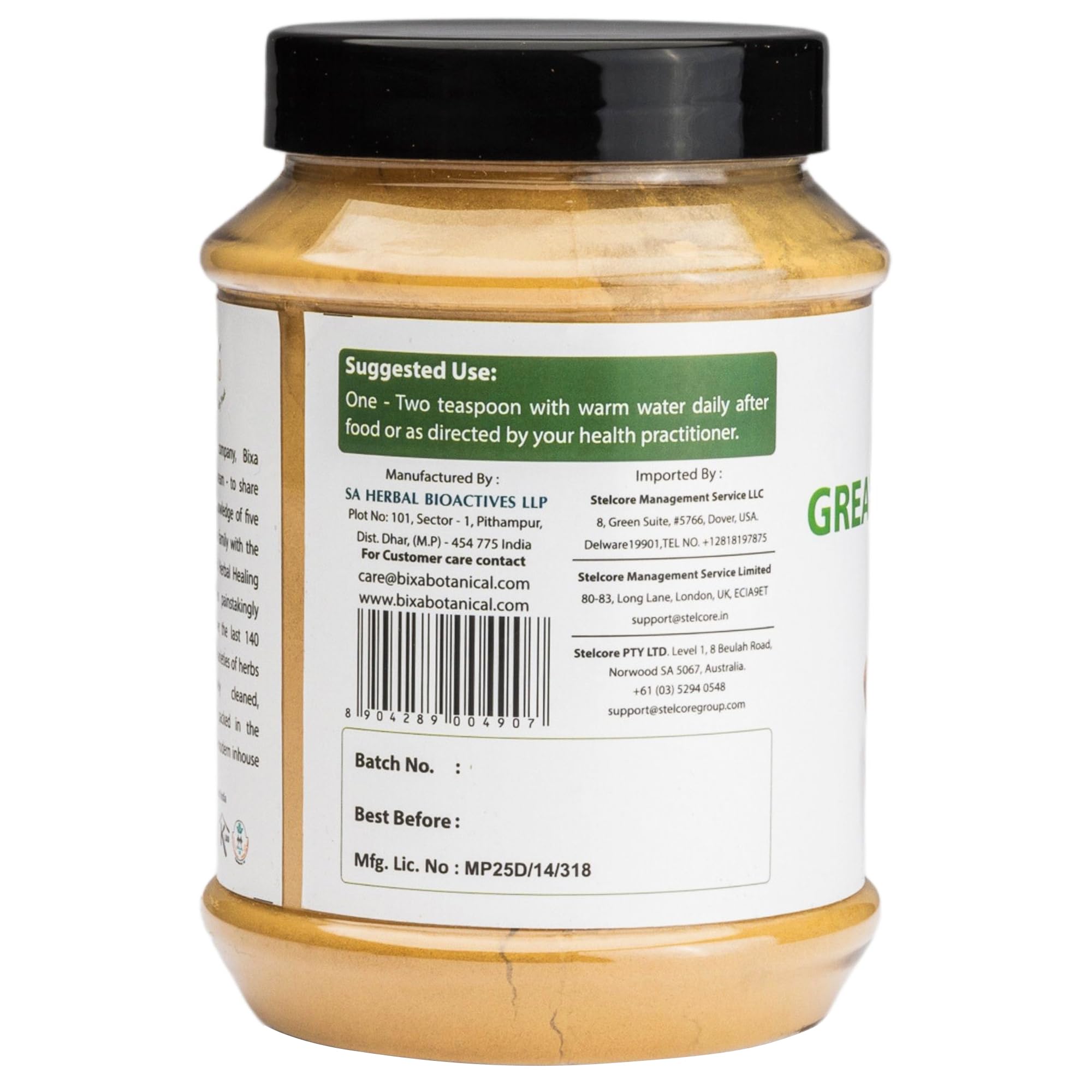 Bixa Botanical galangal powder on a spoon measuring a pinch.