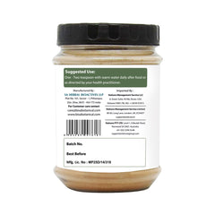 Scoop of Bixa Botanical Pellitory Root Powder ready to mix into a smoothie