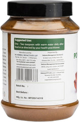 Bixa Botanical Pomegranate Peel Powder used for tea preparation and warm beverages.