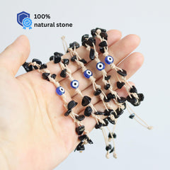 Close-up of natural Black Obsidian beads with a deep glossy surface.
