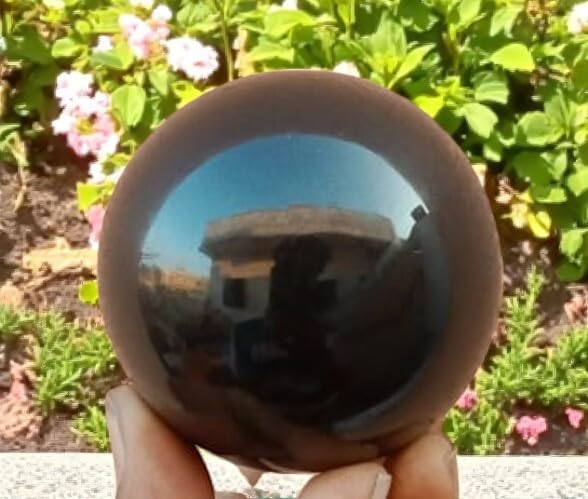 Black Obsidian sphere energy shield enhances present-moment awareness.
