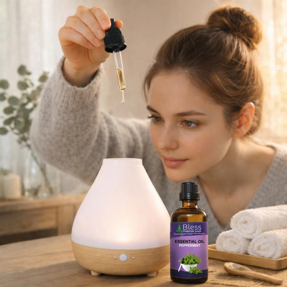 Bless International Peppermint Oil dropper pour demonstrates controlled use and aroma