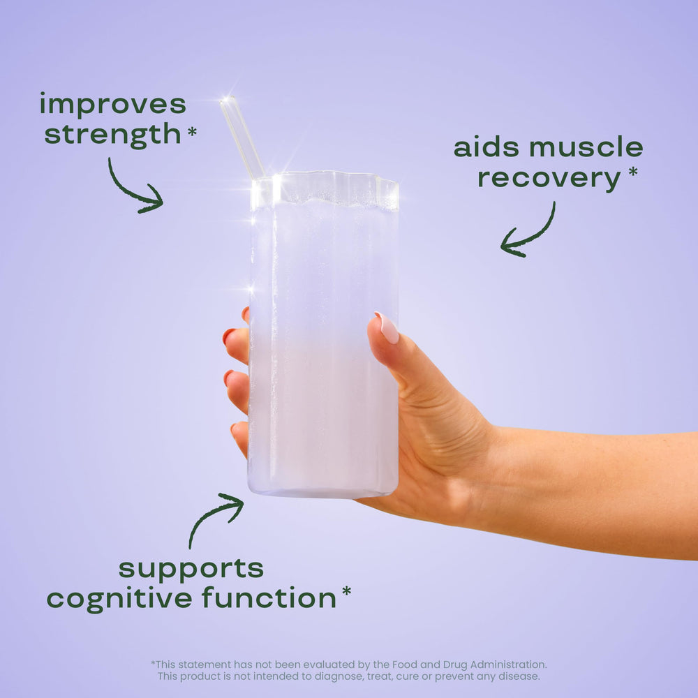 Bloom Nutrition Creatine Monohydrate canister with scoop ready for daily use.