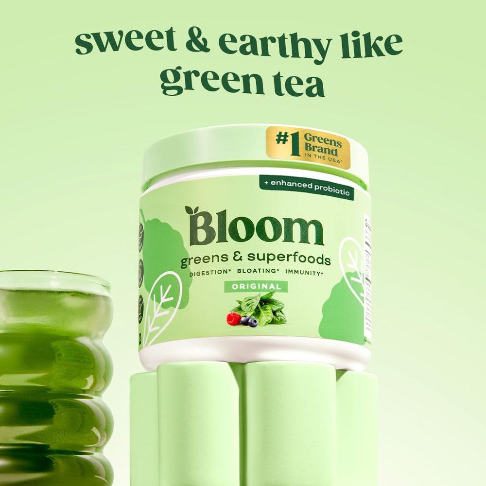 Bloom Nutrition greens powder in smoothie glass for a quick energy boost.