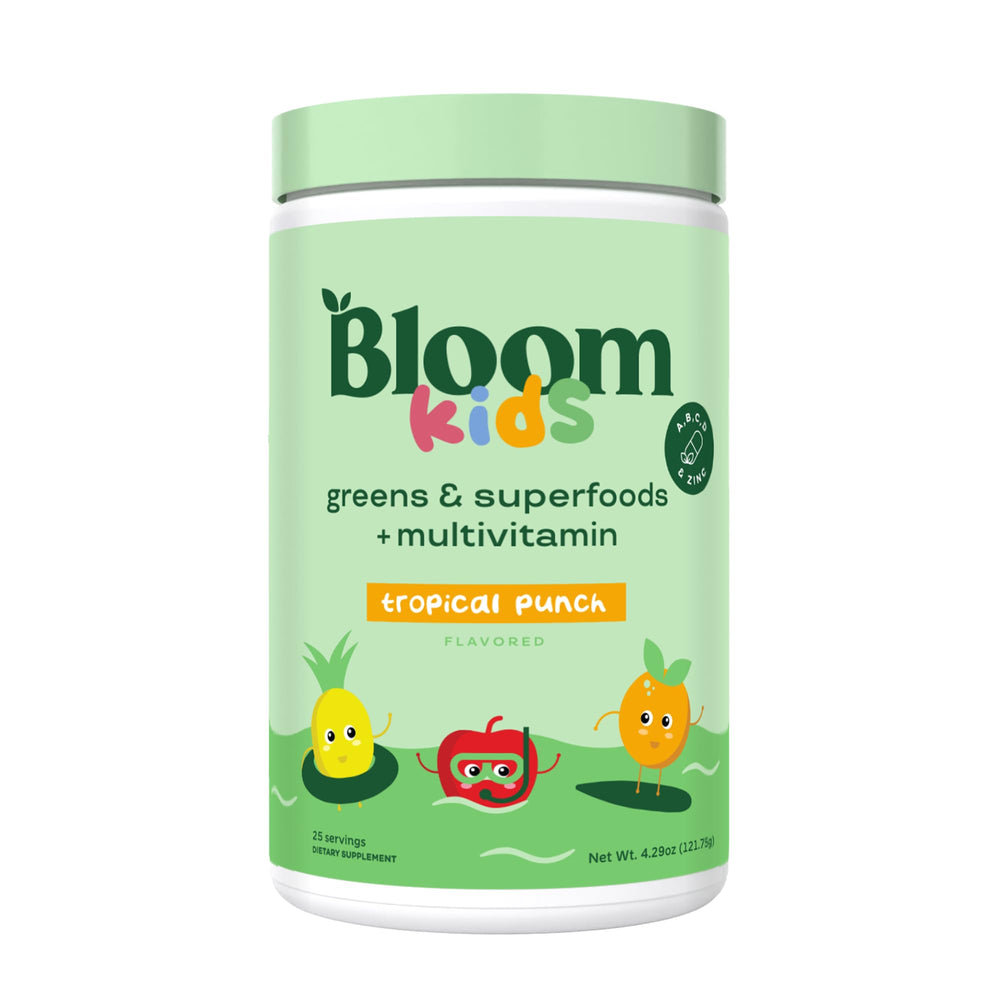 Bloom Nutrition greens powder bottle showcasing tropical punch flavor for kids.