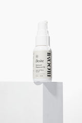 Bloomi Desire Body Oil applied to skin for hydration and softness.