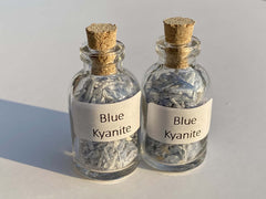 Blue Kyanite mini bottle in hand portable grounding touchstone