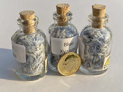 Blue Kyanite bottle showcasing crystal varieties desk or altar use