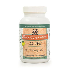 Blue Poppy Zhi Bai Di Huang Wan bottle on a wooden surface for daily balance.