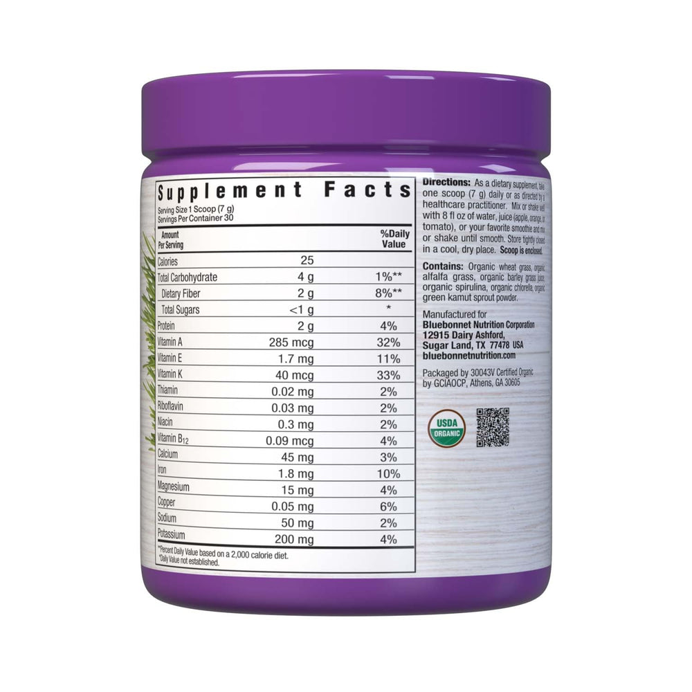 Bluebonnet greens powder scoop beside a glass smoothie for quick nutrition.