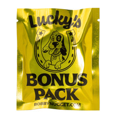 Bobby Nugget Gold Paydirt bag closeup showing glittering flakes and fines.