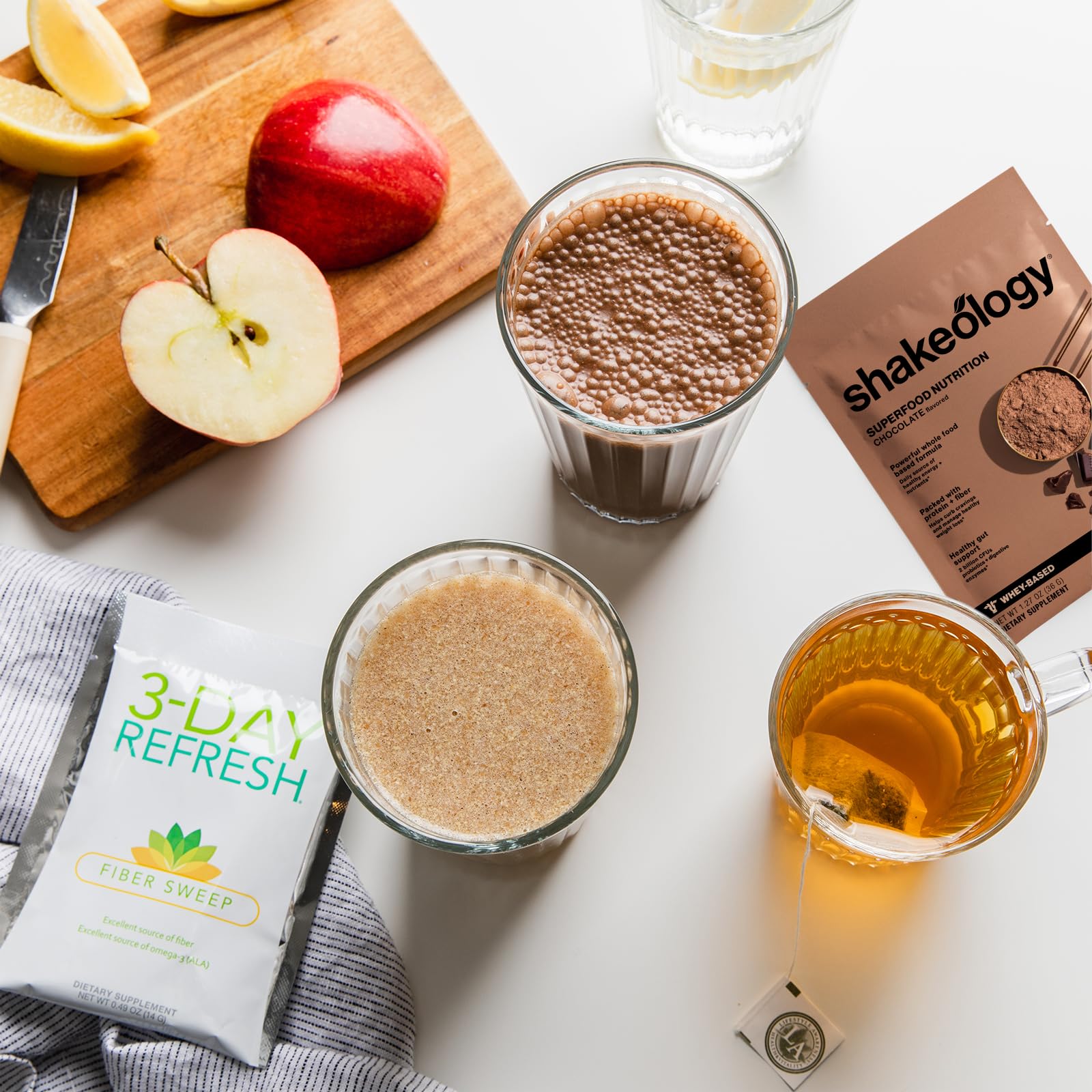 BODi Fiber Sweep scoop and glass illustrating gentle daily detox support