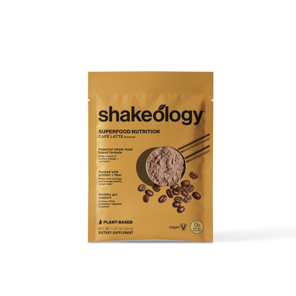 BODi Shakeology Cafe Latte pouring into glass highlights convenient shake preparation