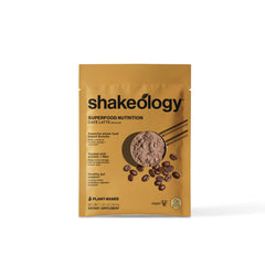 BODi Shakeology Cafe Latte pouring into glass highlights convenient shake preparation