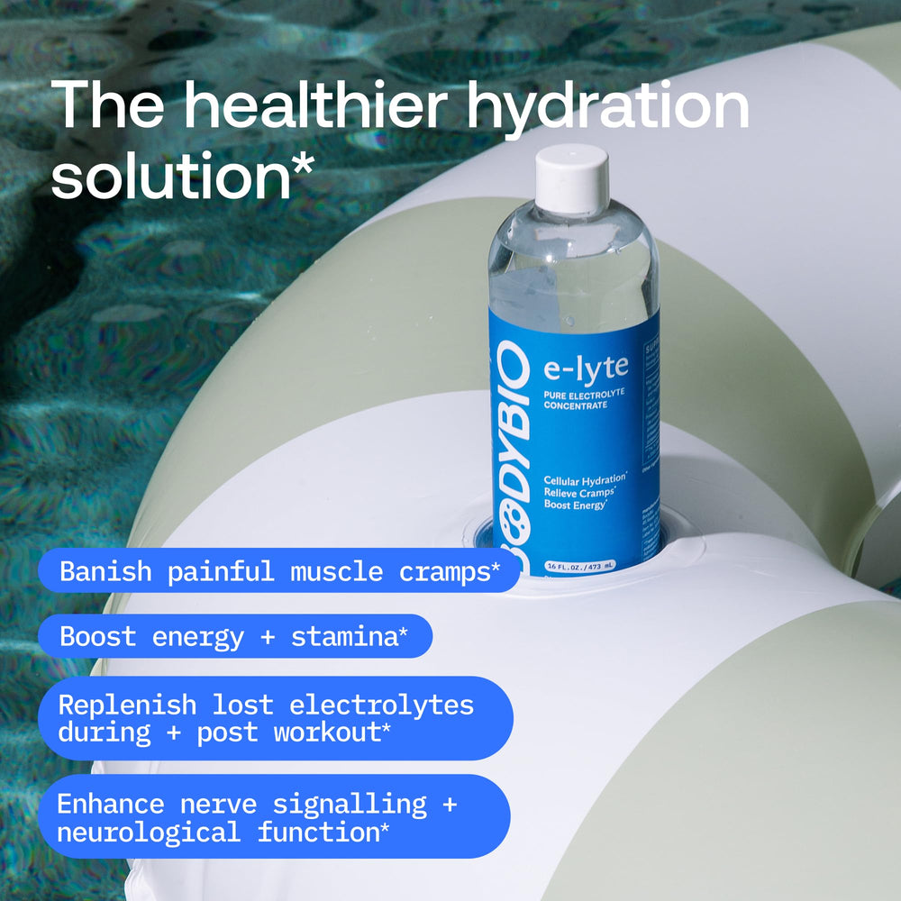 BodyBio e-Lyte liquid poured into water for sugar-free hydration.