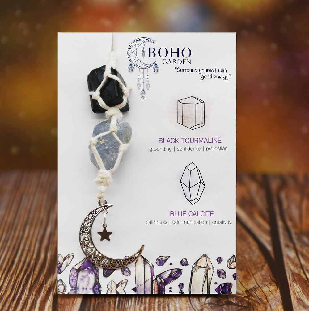 BOHO GARDEN dangling moon and star crystal charm in a car interior