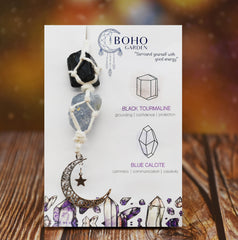 BOHO GARDEN dangling moon and star crystal charm in a car interior