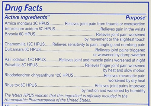 Close-up of Boiron Arnicare Arthritis tablets showing lactose-based formula