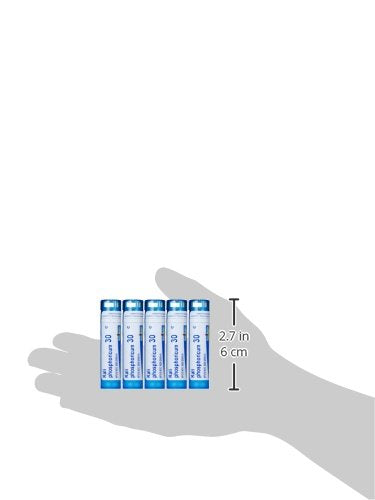 Hand holding tube demonstrates compact, portable potency of Boiron Kali Phosphoricum 30C