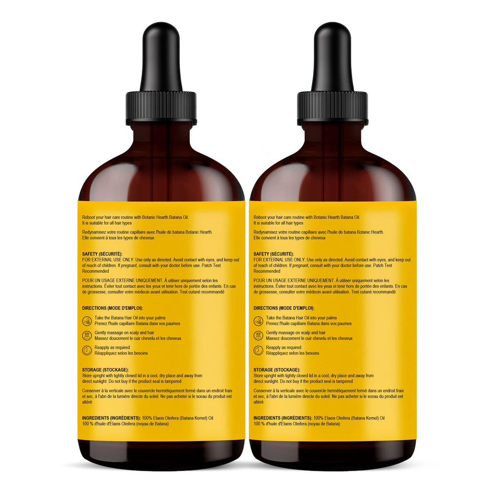 Batana Oil smoothing frizz on hair for a polished look.