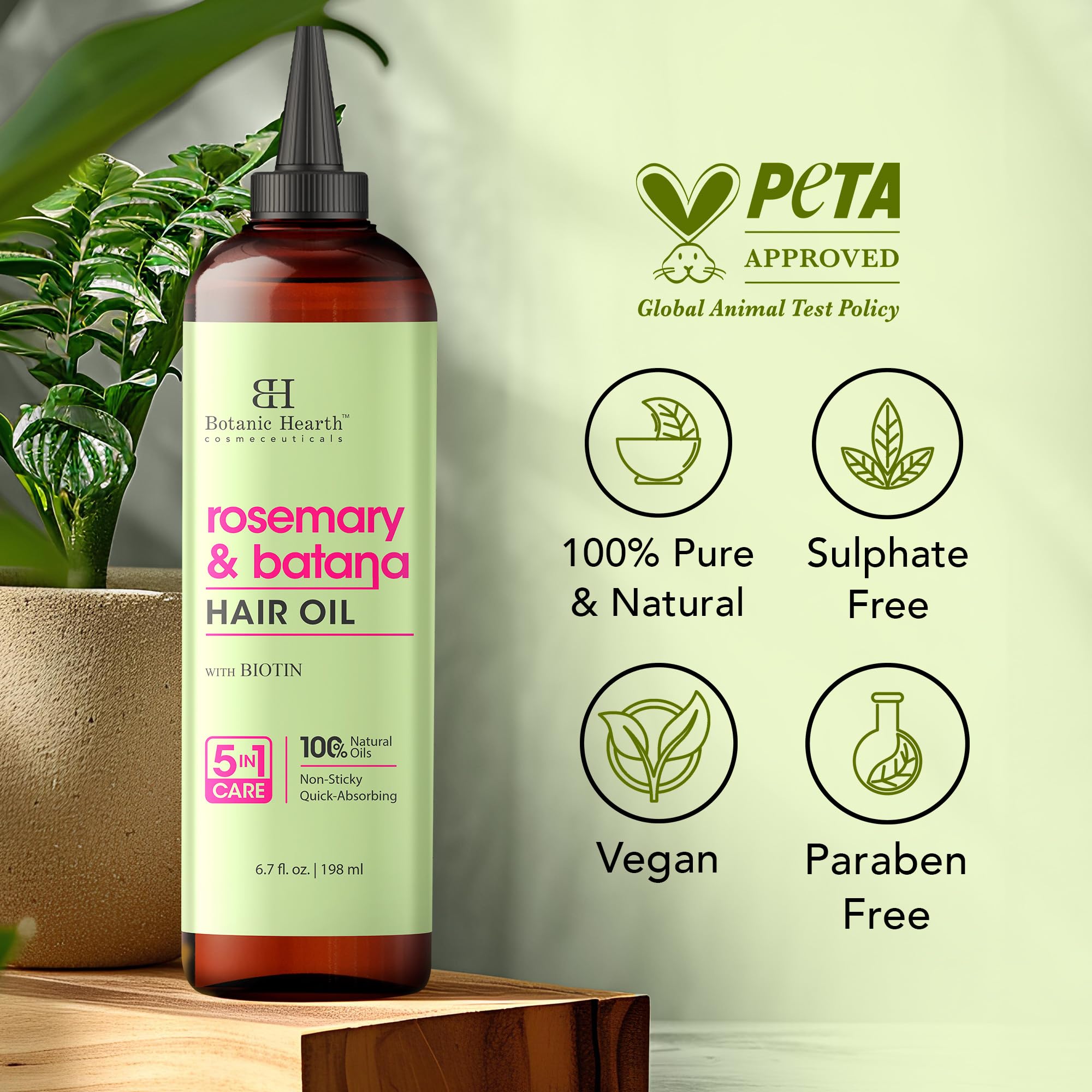 Botanic Hearth Rosemary Batana Hair Oil applied along hair lengths for shine
