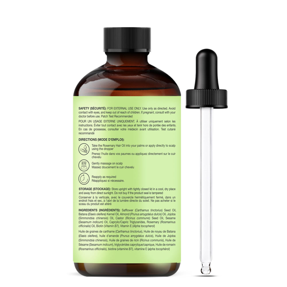 Botanic Hearth rosemary-batana oil drops visible in dropper for controlled use.