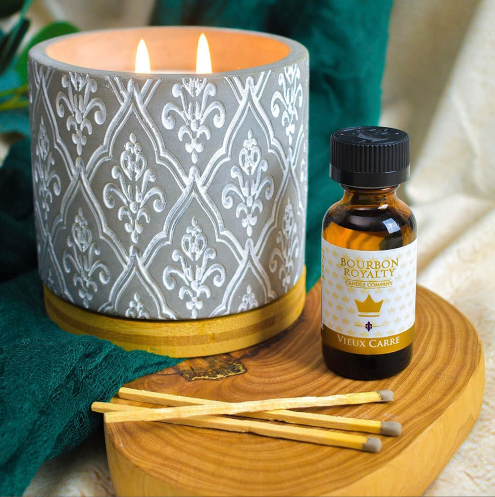 Bourbon Royalty fragrance oil in a wax warmer delivering lasting fragrance.