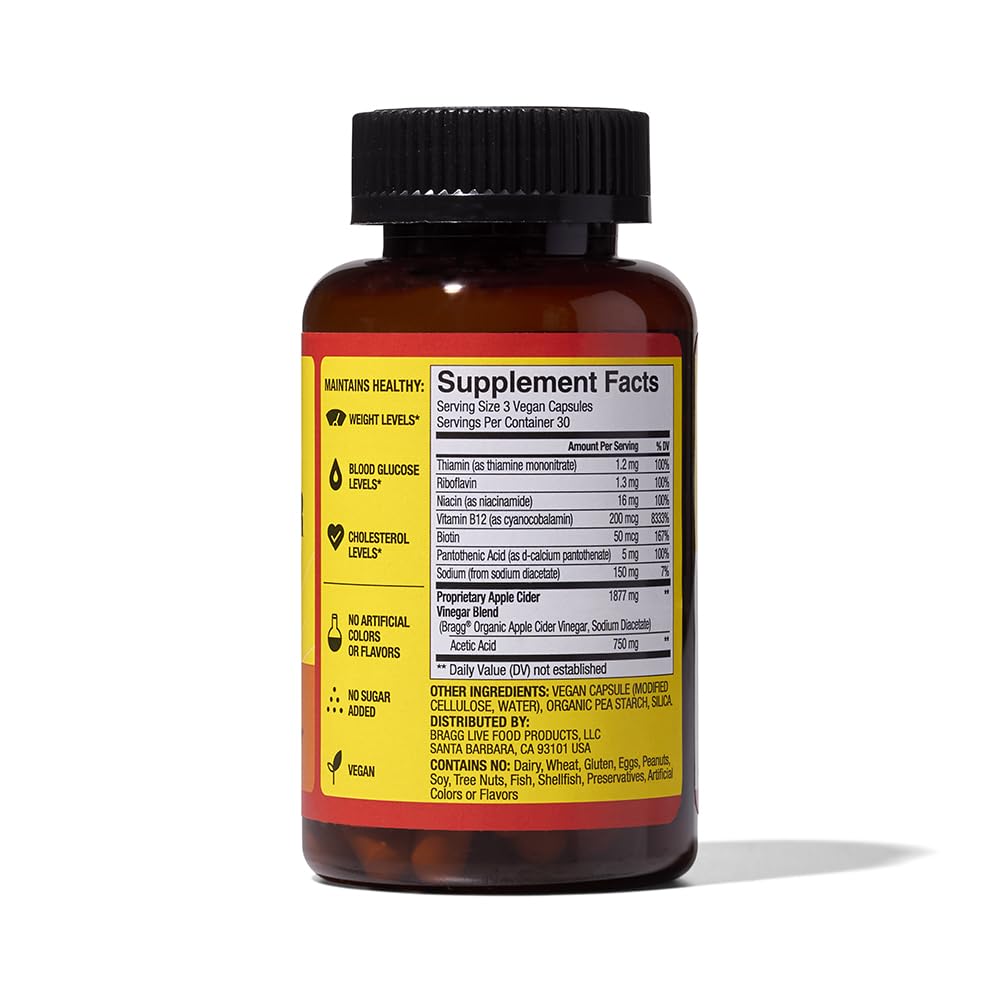Bragg ACV capsules in a glass of water for easy dosing.