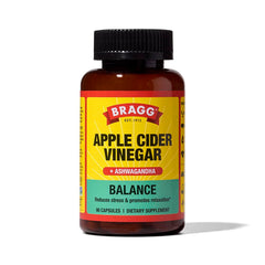 Bragg Daily Balance bottle on a kitchen counter showing branding for daily wellness