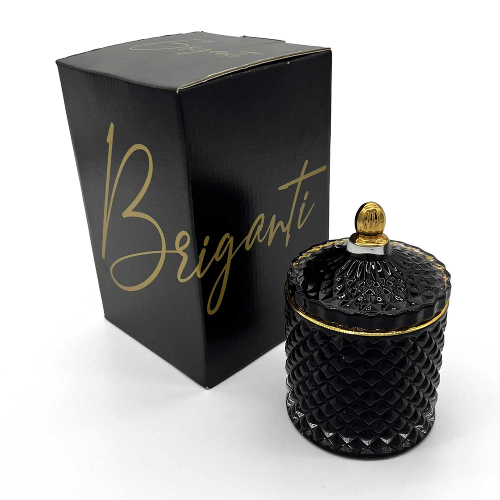 BRIGANTI Vanilla Cupcake candle in a black glass jar releases a warm, inviting aroma.