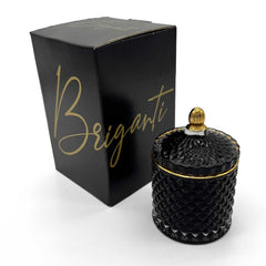 BRIGANTI Vanilla Cupcake candle in a black glass jar releases a warm, inviting aroma.