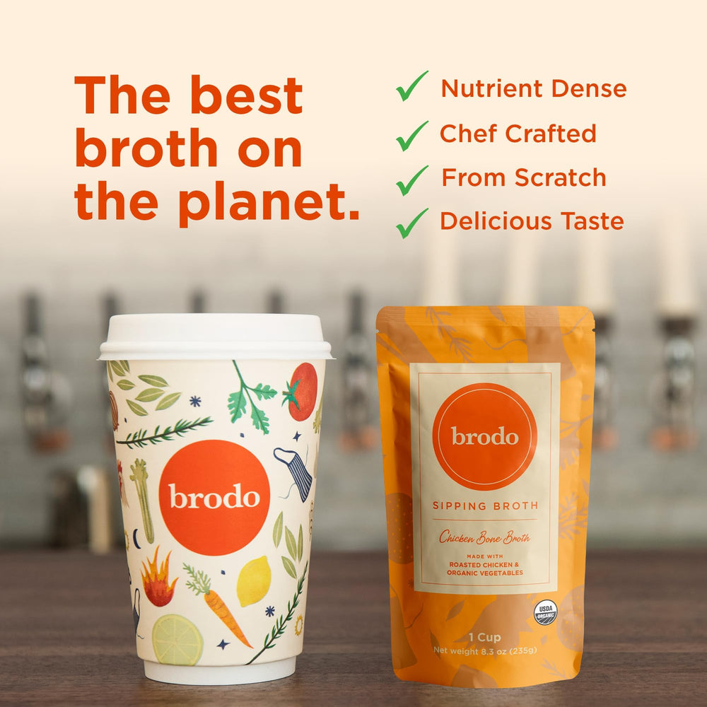 Brodo broth pouch steaming in a cup, ready to enjoy warm and comforting.