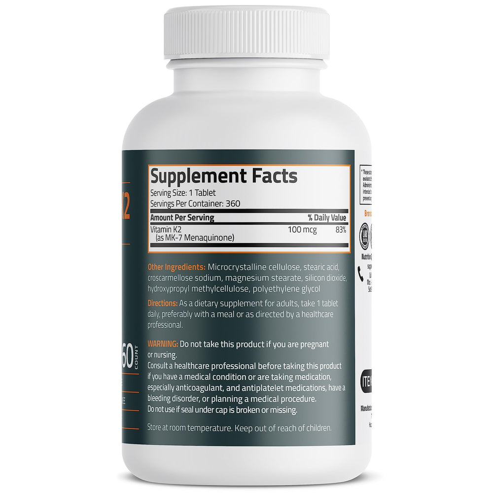 Bronson Vitamin K2 MK-7 tablets close-up with uniform size for easy dosing.