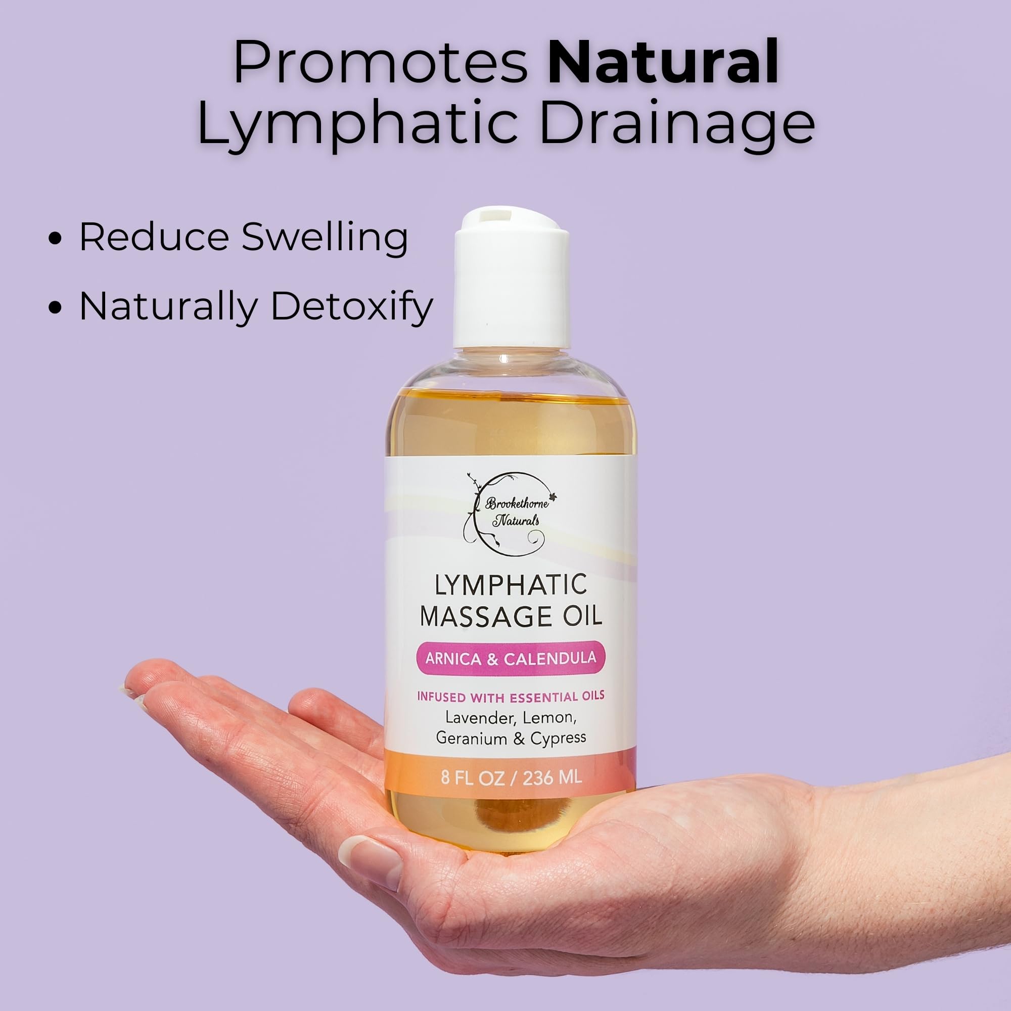 Brookethorne Naturals oil alongside massage tools for smoother technique compatibility.