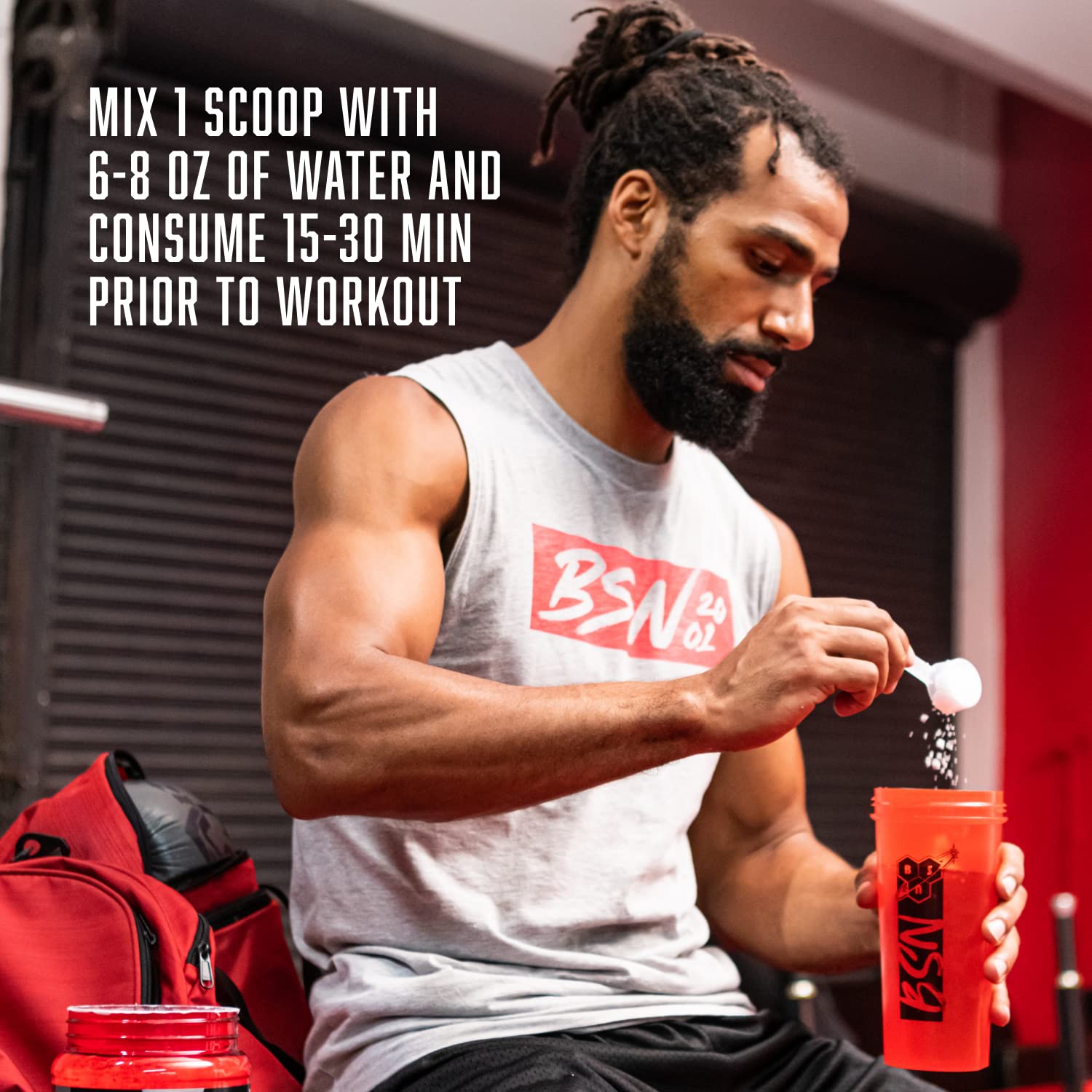 Athlete lifestyle shot using BSN N.O.-XPLODE VASO before a gym session