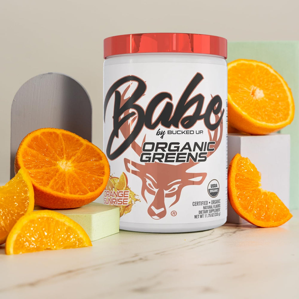 Bucked Up Greens Orange Sunrise mixing action blending into a beverage