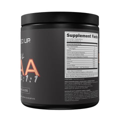 Pour-ready Bucked Up Peach Ring BCAA shown in shaker during training