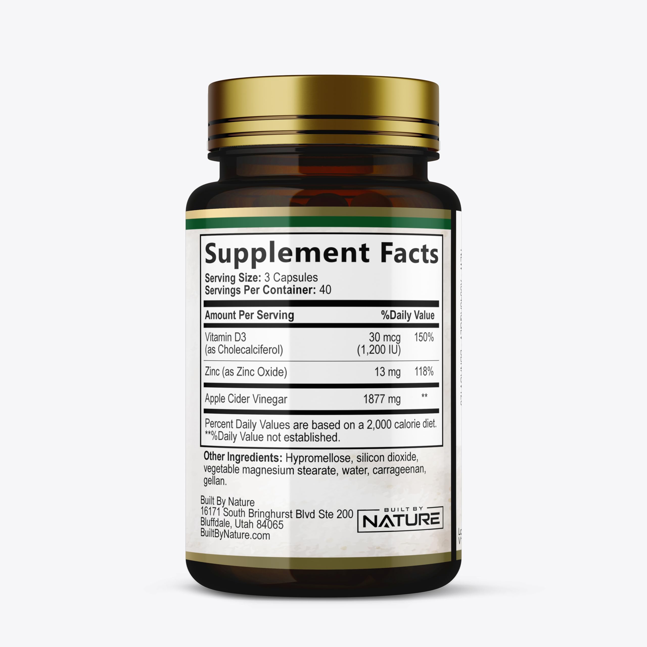 Built by Nature ACV capsules held in hand to show single daily dose.